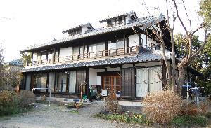 金井義明家住宅主屋の外観の写真